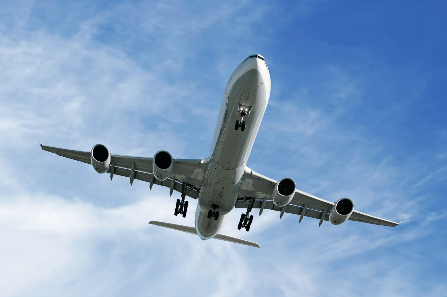 jet airplane flying with renewable fuel